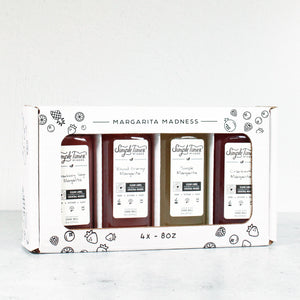 Front view of Sampler Pack box containing four Margarita Madness cocktail mixer bottles (4 x 8 oz) on a white background