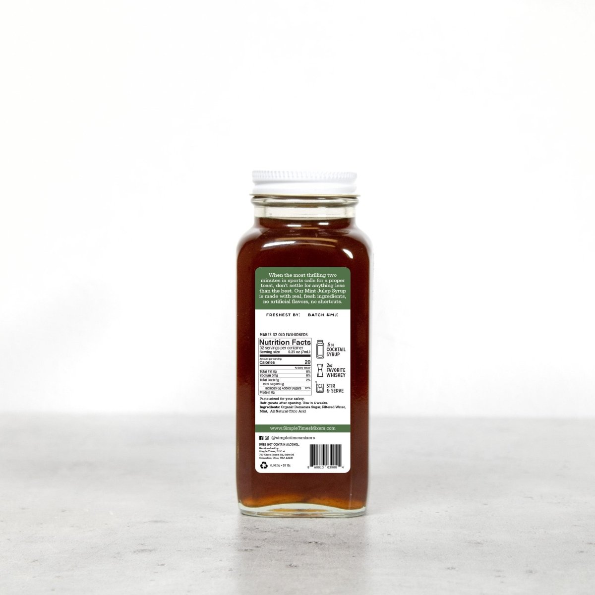 Back view of Mint Julep Cocktail Syrup bottle with nutrition label on a white background