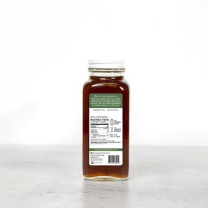 Back view of Mint Julep Cocktail Syrup bottle with nutrition label on a white background