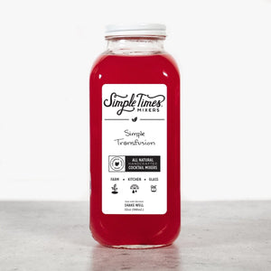 Front view of Simple Transfusion cocktail mixer in a red 32-ounce bottle showcasing its label against a light gray background
