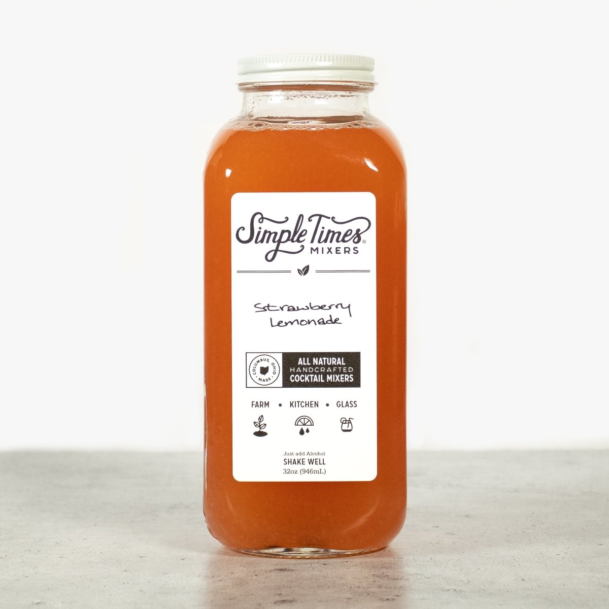 Front view of Strawberry Lemonade cocktail mixer in a 32oz bottle showcasing its labeled design on a white background