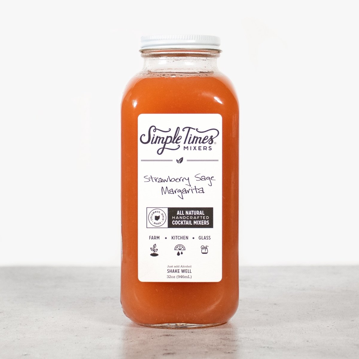 Front view of Strawberry Sage Margarita cocktail mixer showcasing its white label and 32-ounce bottle against a light background